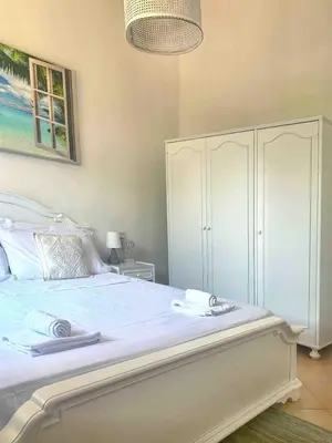 Letto o letti in una camera di Le Caterine 2