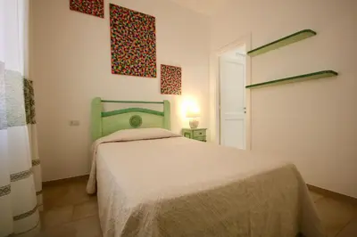 Letto o letti in una camera di Casa Degli Ospiti