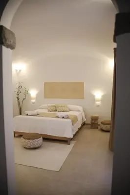 Letto o letti in una camera di Villa Agostina
