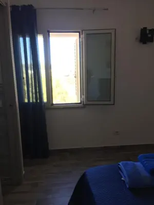 Letto o letti in una camera di Sardegna Mer et Soleil in Olbia