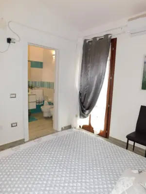 Letto o letti in una camera di B&B Sos Manneddos