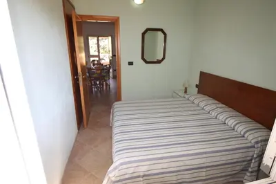 Letto o letti in una camera di Sa Curcurica