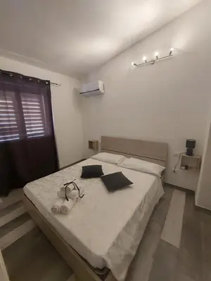 Letto o letti in una camera di La grazia in qualche modo