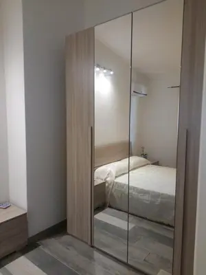 Letto o letti in una camera di La grazia in qualche modo
