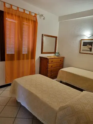 Letto o letti in una camera di Le Canne - Appartamento 