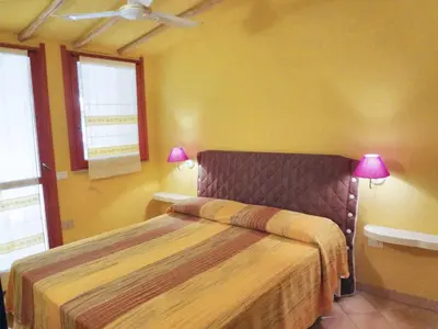 Letto o letti in una camera di Charming house with terrace & garden - Loiri Porto San Paolo