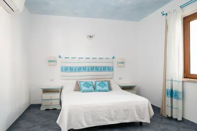 Letto o letti in una camera di Residence Solaria