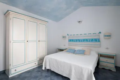 Letto o letti in una camera di Residence Solaria