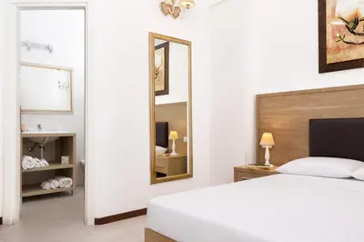 Letto o letti in una camera di Le Residenze del Centro