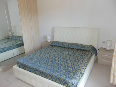 Letto o letti in una camera di Villetta La Caletta