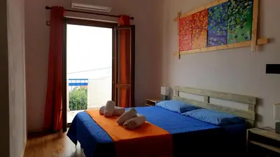 Letto o letti in una camera di B&B Cala Luna