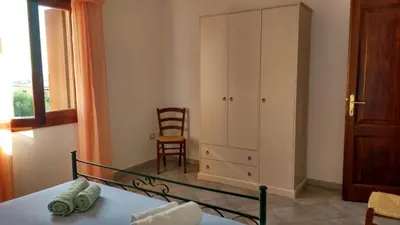 Letto o letti in una camera di Sa Pira