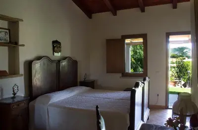 Letto o letti in una camera di Domo Minnannu Miriu