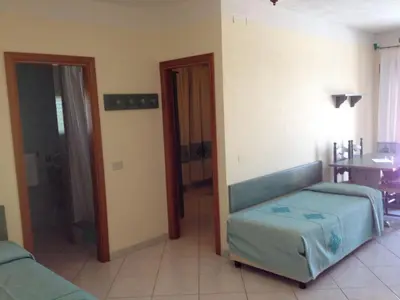 Letto o letti in una camera di Residence Marina Palace