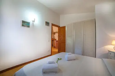 Letto o letti in una camera di villa lilly