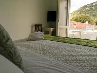 Letto o letti in una camera di B&B Limone