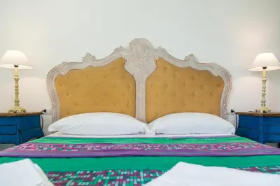 Letto o letti in una camera di Helios Hotel