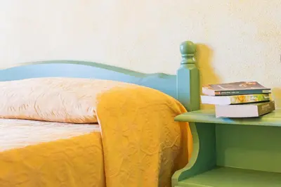 Letto o letti in una camera di Residenza Gli Ontani