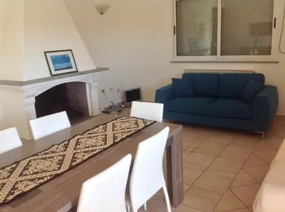 Area soggiorno di casa la caletta