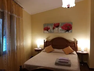 Letto o letti in una camera di Casa singola