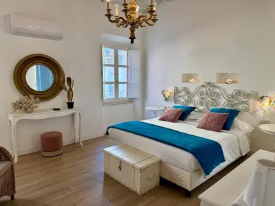 Letto o letti in una camera di In centro unique rooms