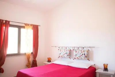 Letto o letti in una camera di Residenze Branca II SeaView