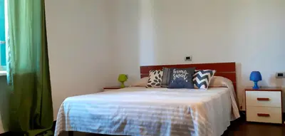 Letto o letti in una camera di 8 Via V. Monti