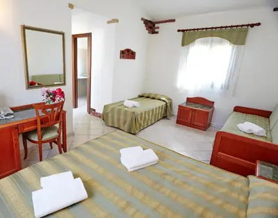 Letto o letti in una camera di Hotel Cala Mirto