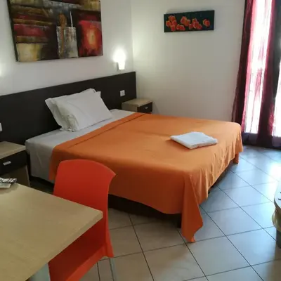 Letto o letti in una camera di La Locanda Del Mare -Domo- Affittacamere