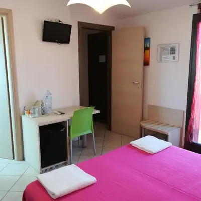 Letto o letti in una camera di La Locanda Del Mare -Domo- Affittacamere