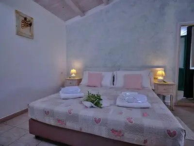 Letto o letti in una camera di Tenute Murales
