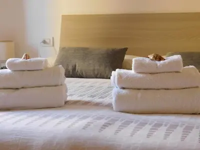 Letto o letti in una camera di La Marina Apartment with Pool