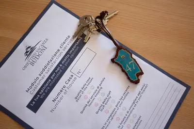 Certificato, attestato, insegna o altro documento esposto da villette acquamarina Budoni