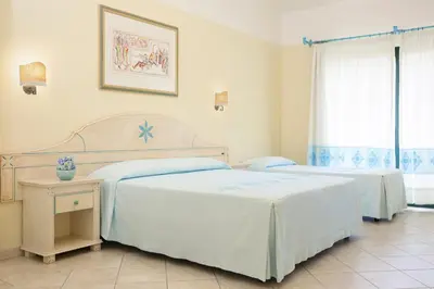 Letto o letti in una camera di Club Hotel Marina Beach