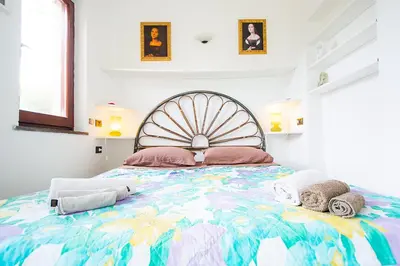 Letto o letti in una camera di Casa Vacanze Rosa Maria