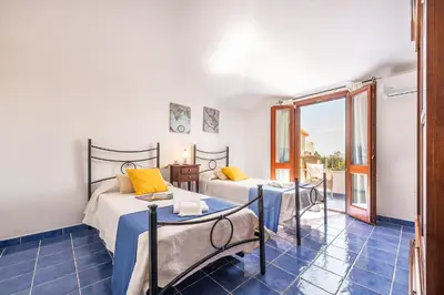 Letto o letti in una camera di AffittaSardegna-Attico Mare