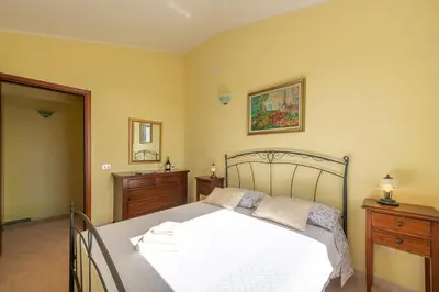 Letto o letti in una camera di AffittaSardegna-Villino Panna