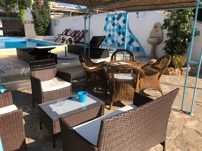 Area soggiorno di Villa Dessena Guest House