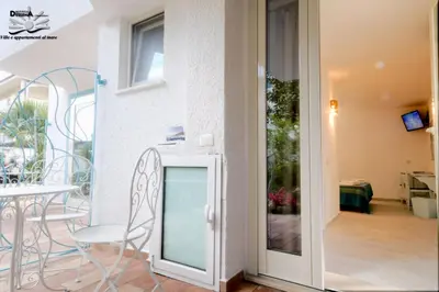 TV o dispositivi per l'intrattenimento presso Villa Dessena Guest House