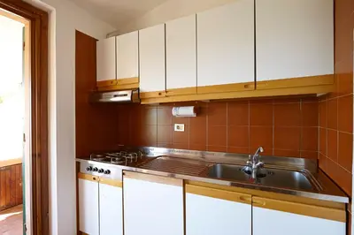 Cucina o angolo cottura di Residence Baia Salinedda