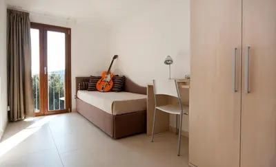 Letto o letti in una camera di Jade Vision