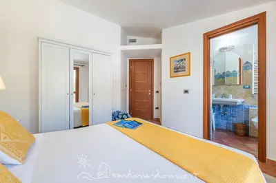 Letto o letti in una camera di CASA CON VISTA MARE