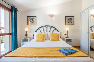 Letto o letti in una camera di CASA CON VISTA MARE
