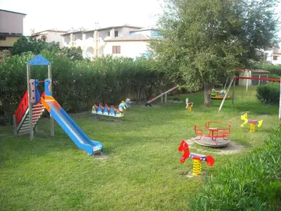 Area giochi per bambini di Residence Cala Liberotto