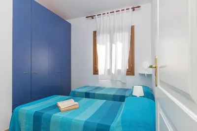 Letto o letti in una camera di Le Dimore di Nettuno