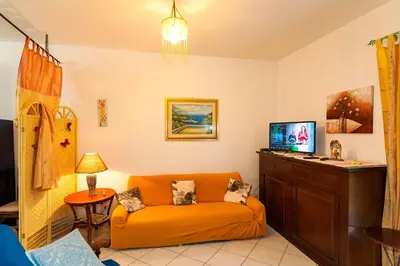 TV o dispositivi per l'intrattenimento presso Appartamento a San Teodoro