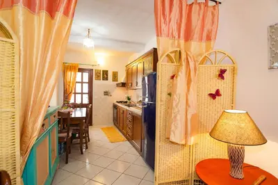 Cucina o angolo cottura di Appartamento a San Teodoro