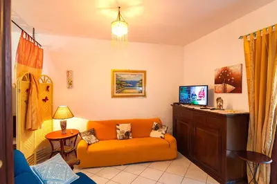 TV o dispositivi per l'intrattenimento presso Appartamento a San Teodoro