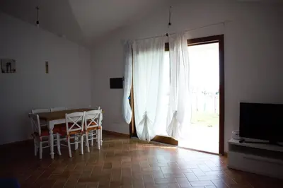 TV o dispositivi per l'intrattenimento presso VILLA FRANCESCA con vista mare La caletta SARDEGNA