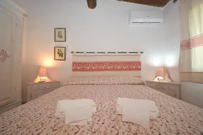 Letto o letti in una camera di Appartamento Maestrale